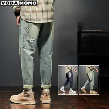 Mens ג 'ינס Sarouel אופנה כיסים Desinger מתאים רופף באגי מוטו ג' ינס גברים רטרו כחול אופנת רחוב רגוע קוני הג ' ינסים.